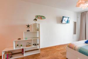 Postel nebo postele na pokoji v ubytování Vivienda Vacacional Paradise