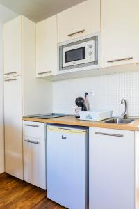 Kuchyň nebo kuchyňský kout v ubytování Vivienda Vacacional Paradise