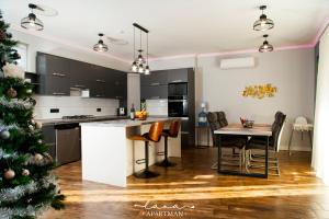 Kuchyň nebo kuchyňský kout v ubytování Lana apartman