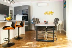 Kuchyň nebo kuchyňský kout v ubytování Lana apartman