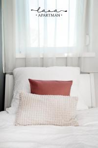 Postel nebo postele na pokoji v ubytování Lana apartman