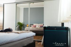 Postel nebo postele na pokoji v ubytování Lana apartman