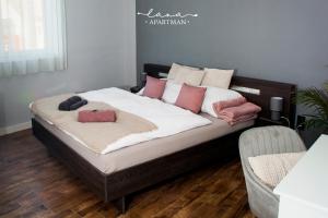 Postel nebo postele na pokoji v ubytování Lana apartman