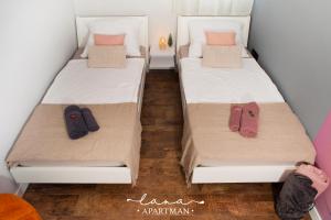 Postel nebo postele na pokoji v ubytování Lana apartman