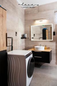 Postel nebo postele na pokoji v ubytování Lana apartman