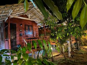 a house in the middle of a forest at Lala's Place in Galle