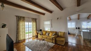 a living room with a couch and a table at Villa Tequila in Adeje