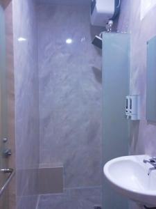 Kúpeľňa v ubytovaní Kelud Syariah Guesthouse