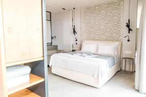 Postel nebo postele na pokoji v ubytování Alissachni SeaSide Hotel