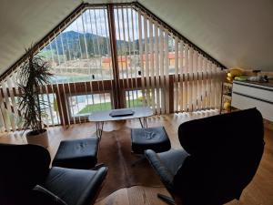 Posedenie v ubytovaní FERIENHAUS A&C DELUXE AM SEE