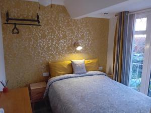 Cama ou camas em um quarto em Sea Air B&B