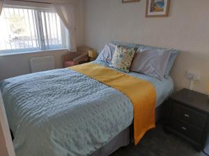 Cama ou camas em um quarto em Sea Air B&B