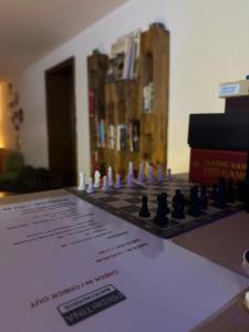 a chess board sitting on top of a table at Hostel Prishtina Backpackers in Pristina