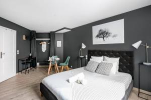 Ένα ή περισσότερα κρεβάτια σε δωμάτιο στο Lys : Cocon Douillet proche Métro