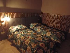 Postel nebo postele na pokoji v ubytování Agriturismo Tenuta Filippi