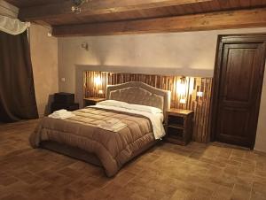 Postel nebo postele na pokoji v ubytování Agriturismo Tenuta Filippi