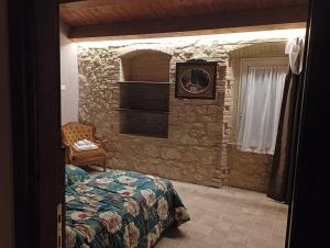 Postel nebo postele na pokoji v ubytování Agriturismo Tenuta Filippi