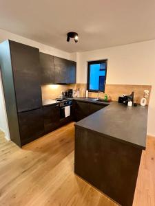 Kuhinja oz. manjša kuhinja v nastanitvi KEEP Hosting M11 Apartments am Kocher mit Balkon, Küche und Parkplatz