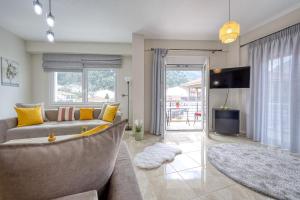 Μια τηλεόραση ή/και κέντρο ψυχαγωγίας στο V&V Central Apartment in Pyli Vol. 2