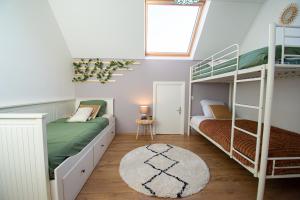 Postel nebo postele na pokoji v ubytování Maen Glas I Jacuzzi & Grand domaine