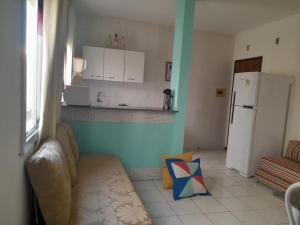 Kuchyň nebo kuchyňský kout v ubytování Guarajuba Residence - Flat