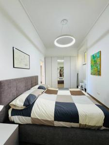 Postel nebo postele na pokoji v ubytování Alocasia luxury stay