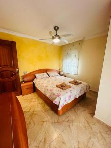 Un pat sau paturi într-o cameră la Apartamento Playa Fuengirola