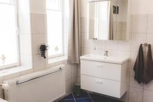 Ένα μπάνιο στο Ferienwohnung Harzer Zippel mit Außensauna +20 φωτογραφίες