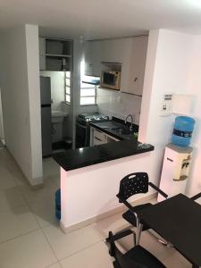 Kuchyň nebo kuchyňský kout v ubytování Aquaville Atalaia T02