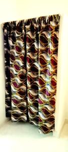 um grupo de diferentes gravatas coloridas numa gaveta em Lalasalama B&B em Watamu