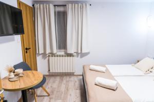Posteľ alebo postele v izbe v ubytovaní Dom Wczasowy U Eli - ruska bania, sauna na wyłączność, basen podgrzewany