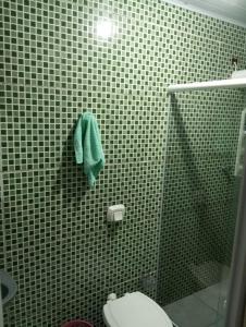 Ванна кімната в Venha curti suas férias