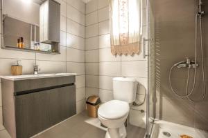 Koupelna v ubytování Green Corner Retro Apartment + 18 fotografií