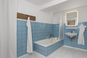 Phòng tắm tại Ferienhaus Zur Alten Burg/Familientreffen/Edersee +32 ảnh