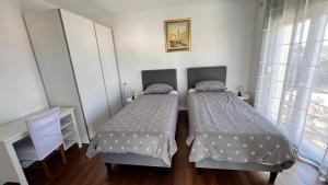 Posteľ alebo postele v izbe v ubytovaní Villa Leandra
