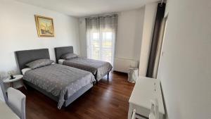 Posteľ alebo postele v izbe v ubytovaní Villa Leandra + 37 fotografií