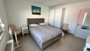 Posteľ alebo postele v izbe v ubytovaní Villa Leandra