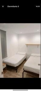 Ein Bett oder Betten in einem Zimmer der Unterkunft Apartamento centro de Córdoba