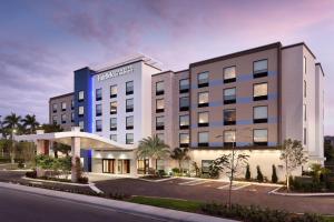 a rendering of the front of a hotel at Fairfield Inn & Suites by Marriott Wellington-West Palm Beach in Wellington