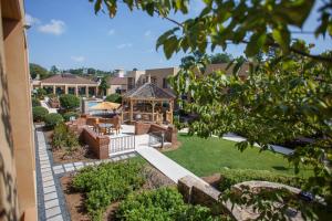 an aerial view of a backyard with a gazebo at Courtyard Atlanta Northlake in Atlanta