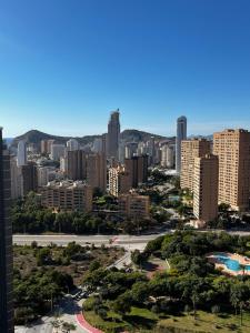 a view of a city with tall buildings at sky intempo resort & spa Benidorm apartment in Benidorm +29 photos