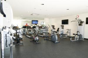 a gym with several treadmills and cardio machines at Walkerville Bliss in Adelaide