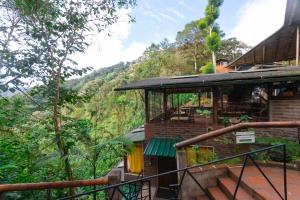 a resort with a view of the mountains at Bellavista Cloud Forest Lodge & Private Protected Area in Tandayapa