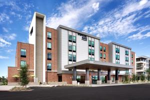 a rendering of the front of a building at SpringHill Suites by Marriott Phoenix Scottsdale in Scottsdale