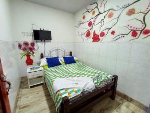 Postel nebo postele na pokoji v ubytování hotel el opita