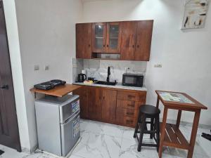 Kuchyň nebo kuchyňský kout v ubytování Studio Le Cosi, Cotonou