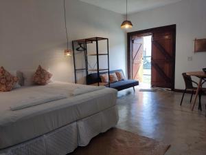 Ліжко або ліжка в номері Verde Ilha Pereque