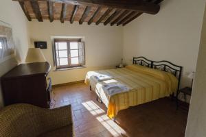 Letto o letti in una camera di Frantoio di Corsanico