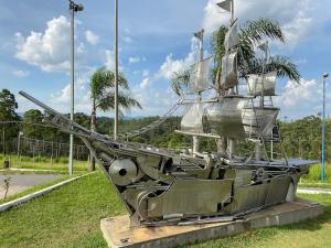 a statue of a ship on display in a field at Araçariguama in Araçariguama