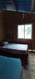 Postel nebo postele na pokoji v ubytování Habitación privada en las islas de San blas icodub